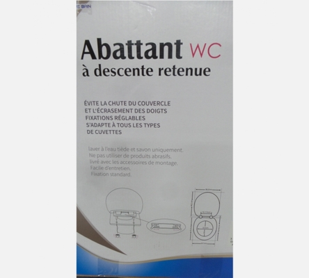 Abattant de toilette à descente douce en plastique blanc.