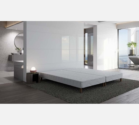 Sommier tapissier Elite en tissu blanc 140/190 cm. Epaisseur 15 cm.